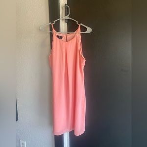 Pink dress. Scalloped around the arm